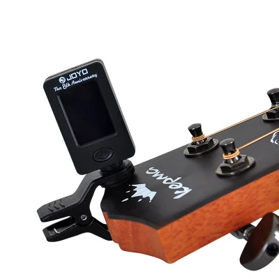 clip-on chromatic digital tuner with LCD display for guitar, bass, ukulele, violin, and other string instruments.